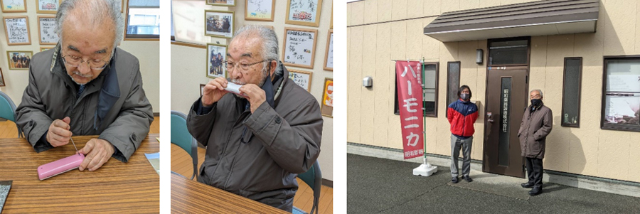 ハーモニカの組み立て体験をする尾池学長